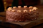 Hazelnut chocolate cake macro of hazelnut on wooden table