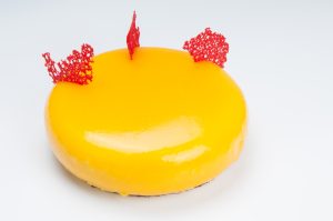 Close up of mousse cake with caramel decorations