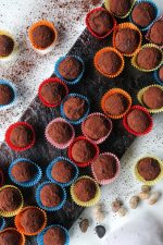 top view chocolates with cocoa on a stand
