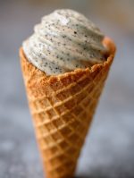 Close Up of Creamy Poppy Seed Ice Cream in a Waffle Cone.