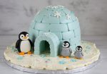 Igloo cake with penguins