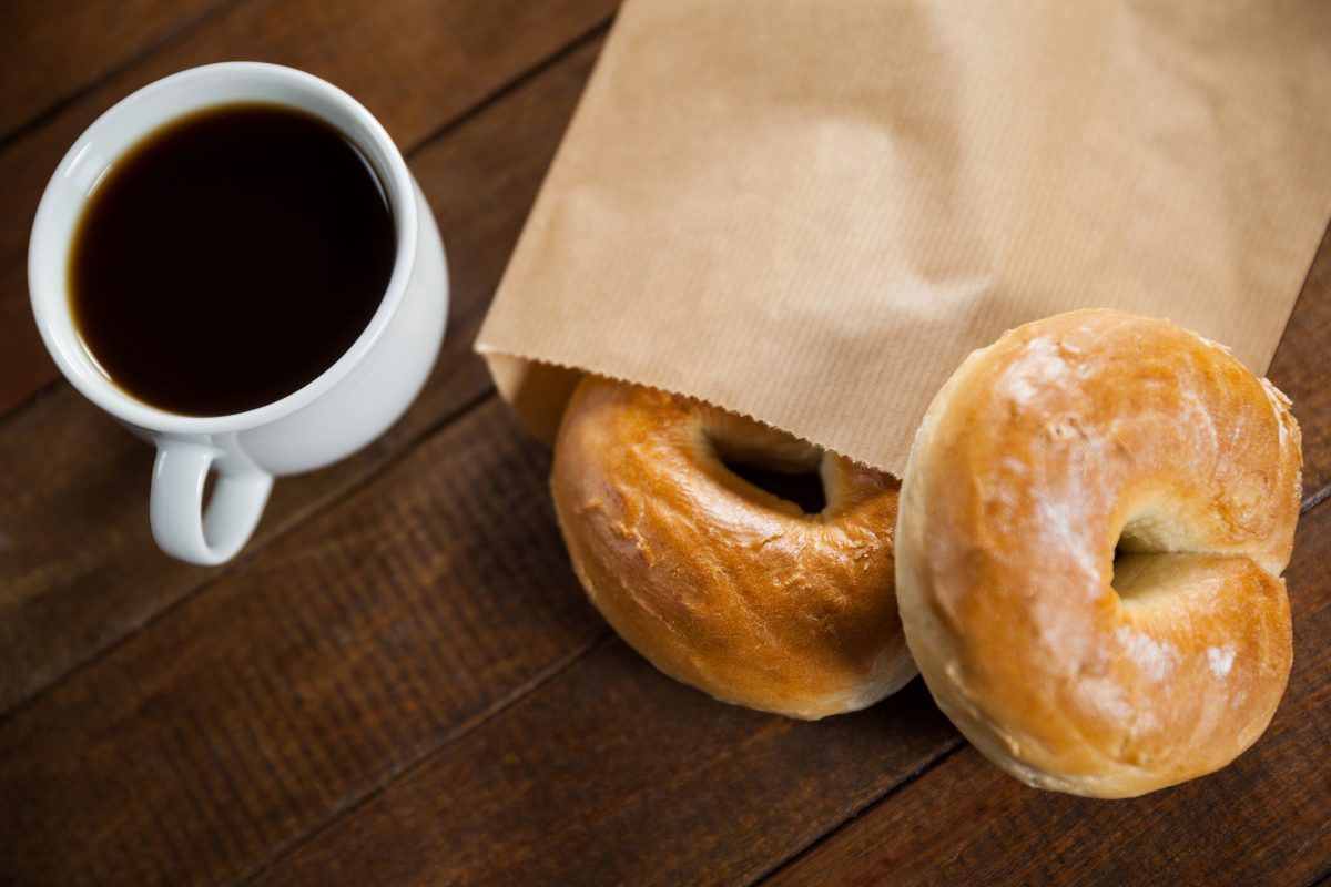 Cup of coffee with bun