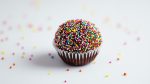 delicious chocolate cupcake with rainbow sprinkles