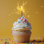 Green Icing Cupcake With Sprinkles on Wooden Table