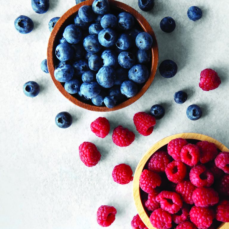 Top,View,Above,Fresh,Pile,Of,Blueberries,And,Raspberries,In