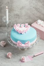 cake decorated with mastic and roses